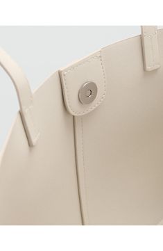 Sleek faux leather distinguishes a spacious shopper perfect for storing your daily essentials with poised sophistication. Magnetic-snap closure Top carry handles Synthetic Imported Daily Essentials, Mango, Faux Leather, Nordstrom, Off White, Leather