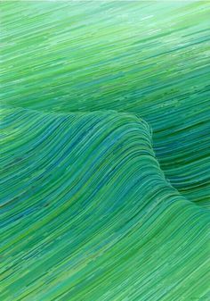 an abstract painting with green and blue lines