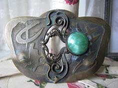 A beautiful antique Art Nouveau Chinese Style Bronze and Czech glass (faux jade) brooch designed by Max Neiger. The stone measures 14.5mm in diameter. The entire brooch measures 3'' x 2''. In beautiful condition with very rich patina and come lovely oxidation. Green Art Nouveau Wedding Brooches, Victorian Green Collectible Brooches, Handmade Antique Green Brooches, Jade Brooch, Brooch Art, Chinese Bronze, Star Ring, By Max, Antique Art