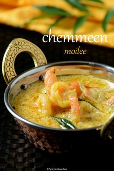 a close up of a bowl of food on a table with the words chemneen molliee