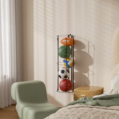 a bedroom with a bed, chair and basketballs on the wall