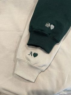 Custom Embroidered Initial Heart Sweatshirt, Embroidery On Sweatshirt Sleeve, Embroidery Couple Design Sweater, Embroidered Heart On Sleeve, Matching Crewnecks For Couples, Embroidery Designs For Couples Hoodies, Embroidered Sleeve Sweatshirt, Matching Gifts For Couples Ideas, Hoodie With Initials On Sleeve