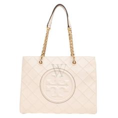 Tory Burch Tote. SKU: 152337-122. Color: New Cream. Size: H: 10.4" x L: 13.8" x D: 11". Tory Burch Napa Leather Soft Chain Fleming Tote. The Fleming tote is made from napa leather with a cotton herringbone lining, and features a bridge with a magnetic snap closure and gusset snaps, chain and leather interwoven shoulder straps with a 9.9" drop and leather-wrapped toggles, a double leather shoulder guard for comfort, and includes one interior front slit pocket and one interior back zipper pocket, all enhanced by a pintuck quilting technique. 100% Leather. Shoulder Guard, Tory Burch Tote, Versace Watch, Tory Burch Handbags, Fine Pens, Quilting Techniques, Cheap Gifts, Denim Shoes, Fragrance Gift Set