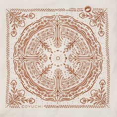 a brown and white paper with an intricate design on it