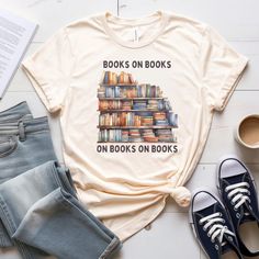 Show off your love for books with this shirt. * * ~ Unisex shirts ~ Made with 100% Airlume combed and ring-spun cotton ~ lightweight fabric that is easy to layer and breathable ~Relaxed fit tee ~Manufactured in the US The Bella + Canvas style 3001 is a unisex style that runs a touch small for men, and about a half a size large for women. For oversized fit - go up 2 sizes, for shirt dress look - go up 3 sizes. These t-shirts have-ribbed knit collars to bolster shaping. The shoulders are tapered for a better fit over time. Dual side seams hold the garment's shape for longer. * For T-shirt Sizes Please refer to the Listing Image* CARE INSTRUCTIONS: DO Inside out before wash, DO warm/cold machine wash DO NOT bleach, DO NOT dry clean, DO NOT iron directly onto the design These are custom made s Books Shirt, Book Shirt, Librarian Shirt, Custom Made Shirts, Gifts For Bookworms, Book Shirts, Gifts For Readers, Unisex Style, Book Lovers Gifts