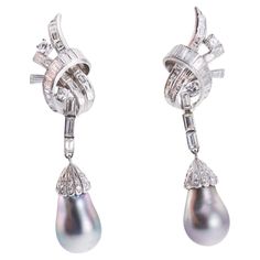 Pair of platinum Midcentury drop earrings, set with approx. 1.60ctw H/VS-Si diamonds and 10.6 x 14mm Tahitian pearls. Earrings are 56mm long. Weight of the pair - 18 grams. Pearls Earrings, Diamond Drop Earrings, Diamond Drops, Tahitian Pearls, Pearl Diamond, Earrings Set, Platinum, Jewelry Earrings, Diamonds