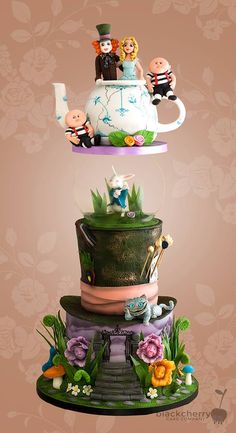 three tiered cake with figurines sitting on top of each other in front of a floral background