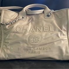 Chanel Large Deauville Tote - Lovingly Used And In Great Condition. Some Scuffing In The Four Corners, Nothing Really Visible When In Use. Purchased In Cannes, France. Comes With Dust Bag And I Might Have The Chanel Shopping Bag It Came In. This Is A Very Light (And Rare) Pink Color, Lamb Skin - Had It Professionally Cleaned Recently. Chanel Shopping Bag, Chanel Shopping, Cannes France, Four Corners, The Four, Cannes, Chanel Bag, Womens Tote Bags, Pink Color