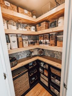 an organized pantry with baskets and food items