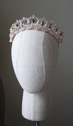 SERENA Crystal Bridal Tiara © DETAILS The SERENA TIARA is a truly BEAUTIFUL and gorgeous Regal Filigree Bridal Tiara... with elegance worthy of a Royal Ball. The sparkle of the crystals is truly breathtaking and this is a tiara fit for a PRINCESS... an instant heirloom piece with classic style and elegance! Available in Gold, Rose Gold, Silver Austrian Crystals Gold / Rose Gold / Rhodium Plated - Rhodium is a derivative of Platinum Tiara at its tallest part : 1.5 Inches (4.45CM) Beautiful creamy Royalty Aesthetic Crown, Luxury Wedding Headpieces, Regal Structured Crown Wedding Headpiece, Regal Structured Crown Headpiece For Wedding, Regal Wedding Headpiece With Structured Crown, Regal Tall Crown Headpieces For Wedding, Elegant Teardrop Crown Wedding Headpiece, Elegant Silver Crown For Wedding, Royal Tall Crown For Wedding