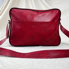 Large Adidas Satchel  Retro Vintage bag  Burgundy Red Colour  Made in 2001 so it's genuine vintage see pic of tag Adjustable strap Large capacity bag Measures 15" Wide 4:5" Deep 11" Height Good condition has few marks and slight bits of peeling see video  Interior is structurally good has few marks see pictures  Amazing looking bag and  great colour way  Has pocket inside bag And outside bag on front  Any questions please ask Shipping is free!! Retro Shoulder Bag, Red Bag, Inside Bag, See Videos, Vintage Adidas, Vintage Bags, Burgundy Red, Large Bags, Purses And Handbags