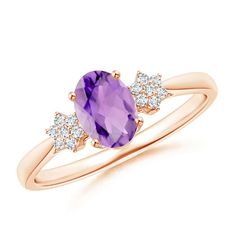 Offering a distinctive appeal, this tapered shank ring features a prong set oval amethyst at its center. Shimmering diamonds form a floral pattern on the lustrous shoulders. The amethyst reflects the color of purple orchids while the diamonds enhance its stunning hue. Crafted in 14k rose gold, this amethyst and diamond ring exudes sheer opulence. Oval Amethyst Ring, Girls Ring, February Birthstone Jewelry, Gold For Women, Purple Amethyst Ring, Split Shank Ring, Amethyst And Diamond Ring, Diamond Solitaire Ring, Gift For Her Birthday