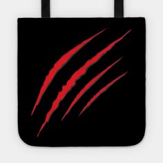 the claws of an animal on a black background tote bag with red and black stripes