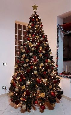 a decorated christmas tree in a living room