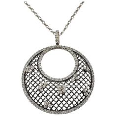 This spectacular pendant necklace features 140 round brilliant cut diamonds set in beautifully detailed 18K white gold.  Approximate total diamond weight:  1.50 ct.  Diamond color: H-I  Diamond clarity: SI1  Size:  16.5 inches (necklace)  48 mm x 39 mm (pendant)  Weight:  9.7 dwt. /  15.2 gr.  Stamped: 3142  AL  750  Very good condition, professionally polished.  Will come packaged in a gift box or pouch (when possible) and will be shipped U.S. Priority Mail Insured. Diamond White Platinum Necklace With Rose Cut Diamonds, Platinum Diamond Necklace With Rose Cut Diamonds, Luxury Rose Cut Diamond Necklace In Platinum, Luxury Platinum Necklace With Rose Cut Diamonds, Platinum Diamond Necklace With Diamond Accents, Rose Cut Diamond Pendant Necklace, Fine Jewelry Rose Cut Diamond Round Pendant Necklace, Luxury Round Pendant Cubic Zirconia Diamond Necklace, Diamond White Round Necklace With Pave Setting