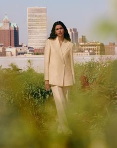 Classic Spring Linen Pantsuit, Classic Linen Pantsuit For Spring, Spring Linen Pantsuit With Notch Lapel, Spring Tailored Pantsuit With Straight Pants, Tailored Spring Pantsuit With Straight Pants, Tailored Straight Leg Spring Pantsuit, Tailored Straight Leg Pantsuit For Spring, Spring Suits With Pressed Crease And Straight Pants, Tailored Straight Leg Spring Suits