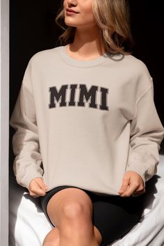 Embroidered Mimi Sweatshirt, Mimi Hoodie, Mimi Sweatshirt, Gift for Mimi Please review both the size and fit charts for your ideal selection Ideal for any situation, a unisex heavy blend crewneck sweatshirt is pure comfort. These garments are made from polyester and cotton. This combination helps designs come out looking fresh and beautiful. The collar is ribbed knit, so it retains its shape even after washing. There are no itchy side seams on these sweaters.  ~Made with a medium-heavy fabric bl Womens Hoodies, Embroidered Sweatshirts, Embroidered Shirt, Cut And Style, Heavy Fabric, Unisex Sweatshirt, Hoodies Womens, Sweat Shirt, Ribbed Knit