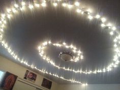 a ceiling with lights that spell out the word love