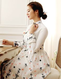 This is a Korean Modern Hanbok Wrap Style Dress for Women. The upper body of the dress is made of lycra blend material for fit and comfort. This hanbok is modernly designed so you can wear it comfortably and beautifully. This modern hanbok is perfect dress for daily and special celebrations such as parties or various events. ⭐You can create a variety of styles by layering skirts of different colors on this dress. Go look Modern Hanbok Skirts: https://www.etsy.com/shop/LunarJogak?ref=seller-platf White High Neck Stretch Dress, White Stretch High Neck Dress, Fitted Spring Dresses With Stand Collar, Feminine White High Neck Dress, Fitted Elegant Ao Dai For Spring, Elegant Fitted Ao Dai For Spring, White High Neck Midi Dress For Spring, Fitted White Ao Dai With Stand Collar, White Fitted High Neck Midi Dress