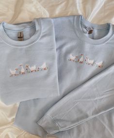 "Embroidered Geese Sweatshirt -Embroidered on a cotton/polyester blend crewneck sweatshirt, this design is simple and minimalistic, perfect for every outfit! -Embroidery design measures 1.5\" x 3\". -See product pictures for shirt sizing chart. **SWEATSHIRTS ARE IN UNISEX SIZING AND RUN TRUE TO SIZE. -All sweatshirts are handmade on an embroidery machine so there may be slight differences, but we only sell the sweatshirts that meet our high-quality standards. -To maintain the quality of your swe Custom Embroidered Cotton Crew Neck Sweatshirt, Cotton Crew Neck Sweatshirt With Embroidered Graphics, Embroidered Cotton Sweatshirt With Relaxed Fit, Crew Neck Sweater With Custom Embroidery, Custom Embroidery Cotton Crew Sweater, Custom Embroidery Crew Sweater, Relaxed Fit Sweatshirt With Custom Embroidery And Crew Neck, Custom Embroidery Relaxed Fit Crew Neck Sweatshirt, Embroidered Crew Sweatshirt With Relaxed Fit