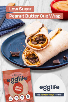 an egglife peanut butter cup wrap on a blue plate