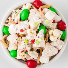 a white bowl filled with christmas treats