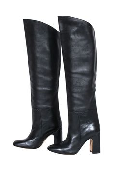 Feel your most fashionable in these Stuart Weitzman black leather tall boots! Step out from the crowd in style this fall whether you dress them up with a little black dress or down with a sweater knit for a cozy, downtown-darling look. Kicking off the season never looked so chic! Size 6 100% Leather Pull on Come with box Heel height 3" Shaft 18" Circumference 15" Fitted Mid-calf Boots With Reinforced Heel For Fall, Classic Mid-calf Boots With Reinforced Heel For Fall, Classic Knee-high Boots For Fall Formal, Classic Knee-high Boots For Formal Fall Occasions, Classic Knee-high Boots For Formal Fall Events, Classic Winter Boots Medium Width, Sleek Boots With Reinforced Heel For Fall, Classic Mid-calf Boots For Fall, Fall Wide Calf Knee-high Boots