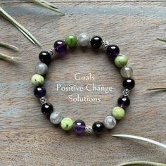 Amethyst, black obsidian, chrysoprase and labradorite gemstones for Positive change and growth - Paravati Goddess Bracelet.   Paravati is the goddess of mountains. She represents breaking your goals into baby steps; taking one step at a time. Call upon Paravati for help to find a solution to your seeming problem. She can help you stay true to your path. I created this bracelet with 8 mm amethyst, black obsidian, chrysoprase and labradorite.  All these stones work together to bring positive chang Bohemian Black Crystal Healing Bracelet, Black Amethyst Gemstone Bracelets, Black Amethyst Gemstone Bracelet, Black Amethyst Crystal Bracelet In Spiritual Style, Spiritual Black Amethyst Beaded Bracelets, Black Amethyst Beaded Bracelets Spiritual, Obsidian Beaded Bracelets With Natural Stones For Healing, Black Amethyst Bracelet As Gift, Black Natural Stones Gemstones For Gift