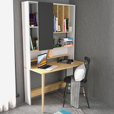 a computer desk with a laptop on top of it next to a chair and bookshelf