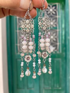 These artisanmade SHOULDER DUSTER EARRINGS 3.5" will caught attention in any occasion you will wear them! Full of details and movement these feminine ear candies are perfect for weddings, bridal showers and any feast where you want to feel like queen. ◾Handmade in sunny Mediterranean island of Cyprus ◾Materials used: Czech glass beads, quality components made of silver plated brass and carefully selected glass beads.Ear wires,chains and all the metal parts (except the charm) are stainless steel, Bohemian Beaded Chain Dangle Chandelier Earrings, Bohemian Chandelier Earrings With Dangling Beads For Party, Bohemian Beaded Chandelier Dangle Earrings, Bohemian Beaded Drop Bridal Earrings, Bohemian Long Drop Chandelier Earrings For Parties, Bohemian Chandelier Earrings For Party, Bohemian Beaded Bridal Drop Earrings, Bohemian Beaded Bridal Earrings, Bohemian Beaded Dangle Bridal Earrings