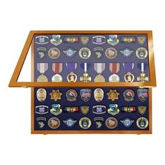 an award display case with medals and badges