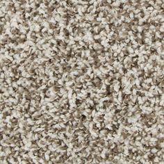 the texture of an upholstered carpet is shown in grey and white colors,