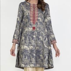 Dress Like Kameez Or Top Made Of Silky Jacquard Fabric. Embroidered With Neckline Details. Brand New With Tags. Grey Noir Color Festive Unstitched Gray Kurta, Elegant Gray Kurta With Resham Embroidery, Gray Straight Kurta For Festive Occasions, Traditional Gray Kurta For Eid, Festive Gray Kurta With Dupatta, Elegant Gray Kurta For Eid, Festive Gray Embroidered Kurta, Festive Embroidered Gray Kurta, Gray Salwar Kameez For Eid