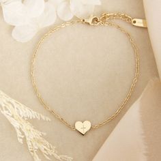 Tiny Heart Cross Bracelet * This listing is for one (1) bracelet * Lengths: 6.5" + 1.5" extender. Lengthens up to 8" * Measurements: 7mm charm * Chain: Delicate simple chain * Finish: 18K gold over surgical or polished surgical steel. Tarnish resistant and waterproof. * Nickel Free and Lead Free. Hypoallergenic. * All our jewelry is packaged in signature LoveStory Collection by MAIVE gift boxes. If you would like multiple items from your order packaged separately please let us know! Please message us if you have any questions about our products, styling, or recommendations. We are happy to help! © 2024 LoveStory Collection by MAIVE Adjustable Heart Bracelet With Jubilee For Valentine's Day, Delicate Adjustable Heart Bracelet For Anniversary, Adjustable Heart Jubilee Bracelet For Valentine's Day, Delicate Personalized Heart Bracelet As A Gift, Adjustable Jubilee Heart Bracelet For Valentine's Day, Heart Bracelet With Extender As Gift, Delicate Adjustable Heart Bracelet For Gift, Dainty Adjustable Bracelet With Heart Pendant, Dainty Adjustable Heart Pendant Bracelet