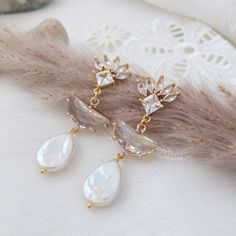 Art Deco Earrings Boho Bridal Earrings With Pearls Long - Etsy Elegant White Earrings For Wedding Reception, Glamorous Gold Pearl Earrings For Wedding, Gold Pearl Crystal Earrings For Wedding, Pearl White Drop Earrings For Wedding, Glamorous Wedding Crystal Earrings With Pearl Drop, Glamorous Wedding Pearl Drop Earrings, Glamorous Pearl White Wedding Earrings, Pearl Teardrop Chandelier Earrings For Wedding, Glamorous Dangle Pearl Earrings For Wedding