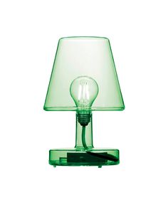 a green table lamp with a light bulb on it's side and a cord attached to the base