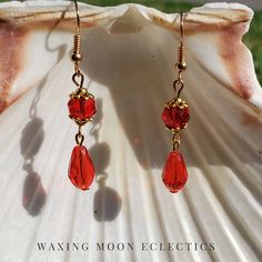 Delicate red beads accented by hypoallergenic gold plated spacers and hooks. Cute Red Dangle Jewelry, Handmade Red Crystal Dangle Earrings, Hypoallergenic Red Dangle Earrings, Red Ruby Dangle Earrings, Red 14k Gold Dangle Earrings, Star Confetti, Ghost Earrings, Red Beads, Earrings Red