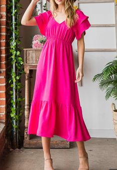 Descubre un estilo atrevido y hermoso con este vestido fucsia. Con un favorecedor escote en V, este vestido es una declaración audaz pero sigue siendo elegante sin esfuerzo. Perfecto para una salida nocturna o una ocasión especial, ¡luce tu estilo con este precioso vestido midi!   ENGLISH   Descubre un estilo atrevido y hermoso con este vestido fucsia. Con un favorecedor escote en V, este vestido es una declaración audaz pero sigue siendo elegante sin esfuerzo. Perfecto para una salida nocturna o una ocasión especial, ¡luce tu estilo con este precioso vestido midi!   Detalles del modelo   Altura 5'5   Busto: 36 / Cintura: 30 / Caderas: 41   Usando M Modest V-neck Midi Dress For Spring, Chic Pink Midi V-neck Dress, Flowy V-neck Maxi Dress For Cocktail, Flowy V-neck Midi Dress For Party, Chic V-neck Midi Dress For Day Out, Modest V-neck Maxi Dress For Day Out, Chic Pink V-neck Dress For Brunch, Casual Pink V-neck Dress For Party, Elegant Pink V-neck Dress For Brunch