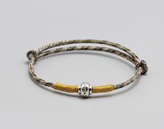 The Tibetan braided Lucky Knot Bracelet is a beautifully crafted accessory Handmade with love and care using the ancient art of Tibetan knot techniques. ✅ KNOTS : Each knot is meticulously tied, resulting in a stunning pattern that symbolizes the interconnectedness of life. The intricate knots create a mesmerizing visual spectacle, capturing the attention of anyone who beholds it. ✅ ADJUSTABLE: Its size is adjustable between 16 -24 cm, and fits standard Unisex sizes, if you need a smaller size it can be adjusted to fit you, please contact me to provide me with your wrist size. ✅ WATER RESISTANT: The bracelet is fully water resistant, so you can swim and shower with it, the quality of the materials I use guarantees its durability.  ✔️This bracelet is not only a fashion statement, but also h Kabbalah Bracelet, Braided Rope Bracelet, Buddhist Bracelet, Lucky Charm Bracelet, Tibetan Bracelet, Om Charm, Prayer Bracelet, Thread Bracelets, Yoga Bracelet