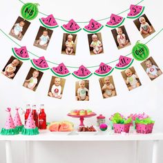 a watermelon themed birthday party with pink and green decorations on the table, photo garland