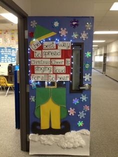 the door to an office decorated with christmas decorations and snowflakes is shown in this instagram