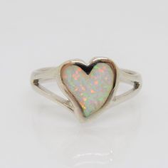 Vintage Sterling Silver White Opal Heart Ring ...Marked 925...Total of weights 2.9grams...Size 8...Measure of Face 12MM...It's in very good condition.  B Silver Hallmarked Heart Ring, Silver Hallmarked Heart Cut Ring, Silver Heart Cut Hallmarked Ring, Silver Heart Cut Hallmarked Heart Ring, Sterling Silver Heart Ring Stamped 925, Stamped 925 White Gold Heart Ring, Baddie Jewelry, Opal Heart Ring, Opal Ring