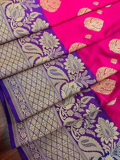 Beautiful Pink Banarasi Handloom Saree with Purple Border with Gold Zari on border and Blue Pallu. The Saree is Banarasi silk with gold buttas on all over the saree.Material is very soft and easy to drape and carry. PLEASE NOTE BORDER IS 7.5 INCHES WIDE. Color : Hot PinkBase Fabric : Banarasi Silk Blouse piece : Comes with Blouse pieceBlouse material : Banarasi Silk Fall & Edging: Comes with Fall and edging (Pico) and tassels attached Disclaimer -:- Color variation is possible due to various rea Purple And Pink Border Sarees, Purple Banarasi Silk Saree With Border, Banarasi Silk Anarkali With Border Detail, Purple Art Silk Traditional Wear With Border, Banarasi Silk Traditional Wear With Border For Diwali, Pink Traditional Wear With Border For Puja, Purple Traditional Wedding Wear With Border, Pink Raw Silk Saree With Border, Pink Tussar Silk Traditional Wear With Border