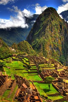 the ruins of machaca picach are surrounded by mountains