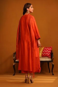 Orange straight kurta with floral applique patch work on the yoke, scattered buttis on the flare and sleeves. Paired with a trouser and dupatta with floral tassels. - Aza Fashions Women Kurta, Straight Kurta, Patch Work, Flower Applique, Appliqué Patch, Floral Applique, Set Women, Full Sleeves, Aza Fashion