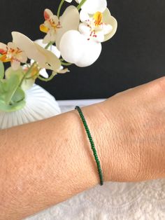 Emerald green dainty beaded bracelet, thin seed bead bracelet, tiny beads dark green bracelet, slim delicate simple bracelet ❤SIZES This item comes in several sizes, kindly choose at checkout. The standard size for an average woman is 7". For a child, perhaps a 6" would be appropriate. If you'd like a clasp extender because you are unsure of the right size, please add this to the cart: https://www.etsy.com/listing/187503833/clasp-extender ❤ PROCESSING AND SHIPPING Most orders are made and shippe Dark Green Bracelet, Average Woman, Green Bracelet, Tiny Beads, Bracelet Simple, Seed Bead Bracelet, Simple Bracelets, Seed Bead Bracelets, Bead Bracelet