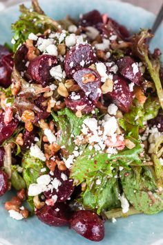 a salad with beets and feta cheese on top