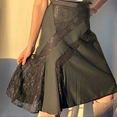 "Beautiful black lace skirt. Fully lined, lace inserts, asymmetrical hem line. Skirt only. Top not included Size: 6 Brand: The Limited Closure: Back zipper. Condition: Preowned Vintage Excellent. No visible rips stains or imperfections. Measurements (lying flat not stretched): Waist 14.5\". Length from front 25\"." Fitted Party Skirt With Lace Patchwork, Fitted Skirt With Lace Patchwork For Party, Fitted Lace Patchwork Skirt For Party, Fitted Lace Asymmetrical Skirt, Fitted Skirt With Asymmetrical Hem For Alternative Fashion, Black Gothic Skirt With Asymmetrical Hem, Black Lace Patchwork Party Skirt, Black Lace Patchwork Skirt For Party, Gothic Fitted Skirt With Lace Trim