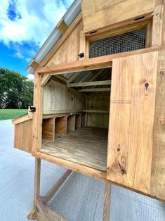 a chicken coop built into the side of a building