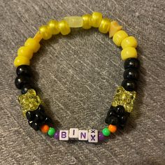 Binx The Talking Cat With Black Fur And Yellow Glowing Eyes. Yellow Glowing Eyes, Halloween Kandi, Talking Cat, Glowing Eyes, Halloween Bracelet, Cat Talk, Bead Bracelets, Hocus Pocus, Fall Wardrobe